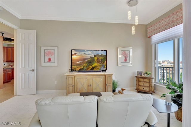 tiled living room featuring plenty of natural light and ornamental molding