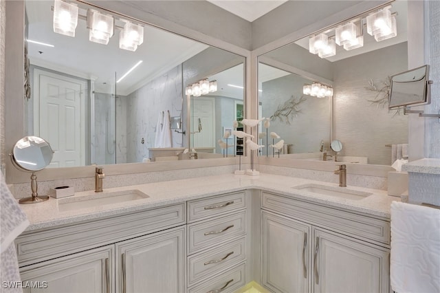 bathroom featuring vanity and a shower with shower door