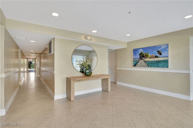 hallway with light tile patterned floors