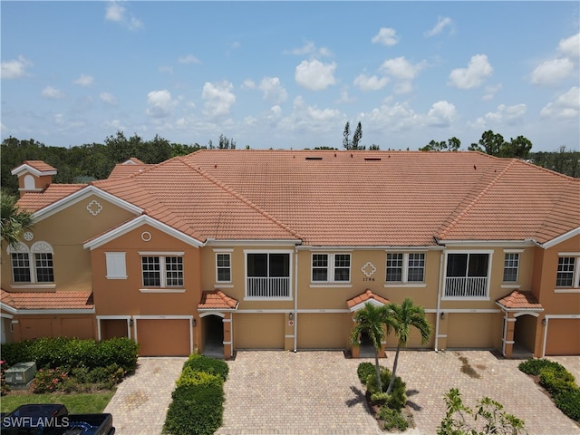 view of front of property with a garage