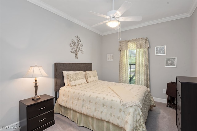 bedroom featuring ornamental molding, ceiling fan, and light colored carpet