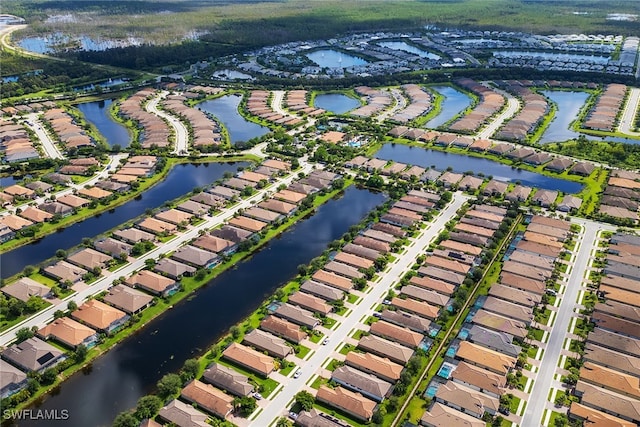 bird's eye view with a water view