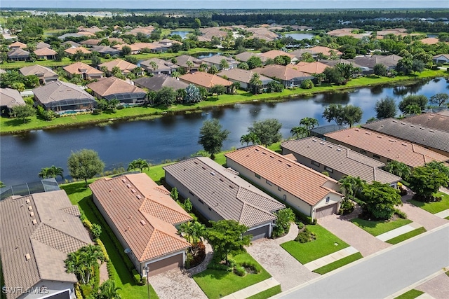 bird's eye view with a water view