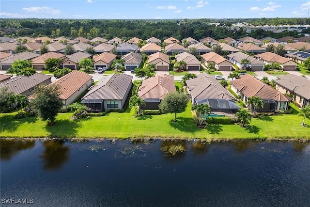 drone / aerial view with a water view