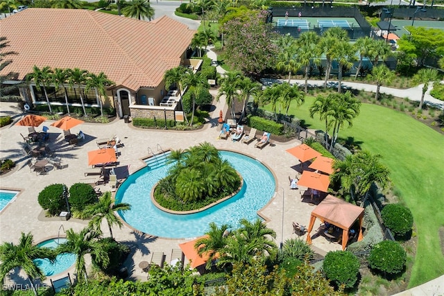 view of swimming pool with a patio