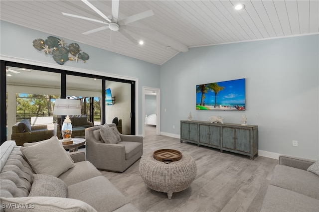 living room featuring light wood-type flooring, lofted ceiling with beams, ceiling fan, and wooden ceiling