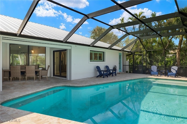 view of pool featuring a patio and a lanai