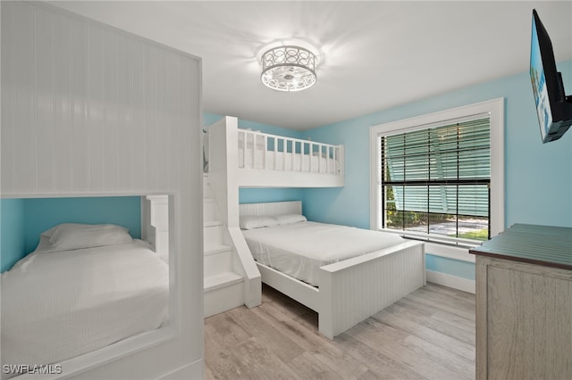 bedroom with light wood-type flooring