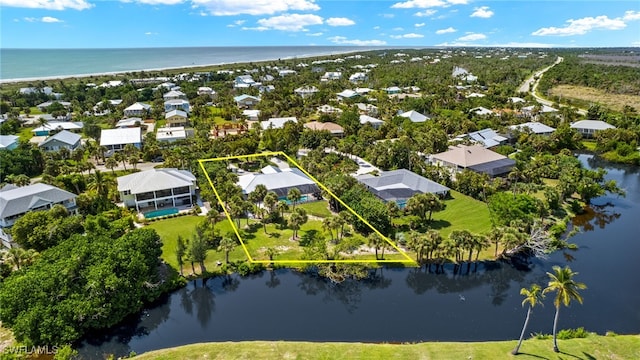 drone / aerial view with a water view