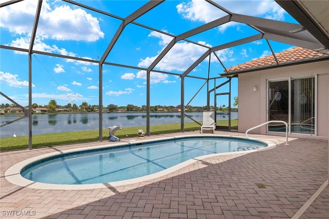 2249 Valencia Lakes Cir, Naples, FL 34120 - outdoor pool featuring a water view, a patio, a lanai, and a lawn