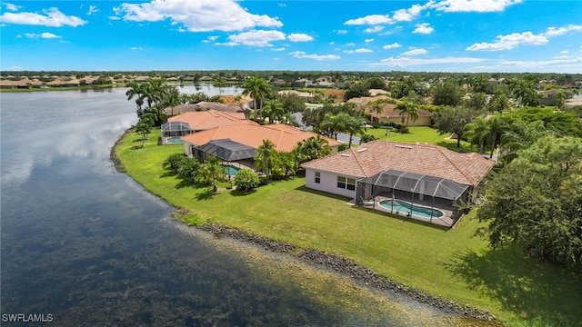 drone / aerial view with a water view