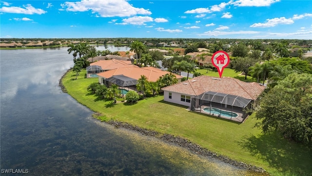 drone / aerial view with a water view