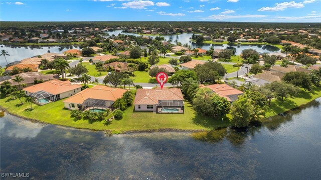 bird's eye view with a water view