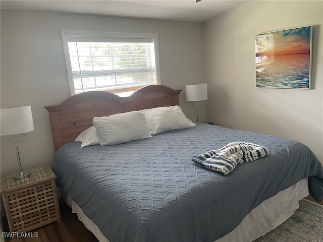 bedroom featuring wood-type flooring