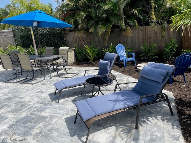 view of patio / terrace featuring a fire pit