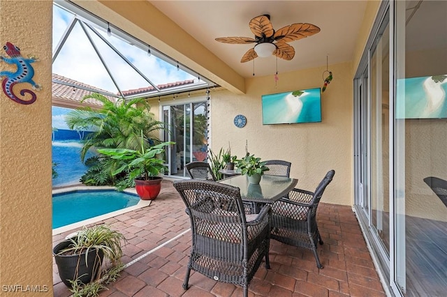 11490 Axis Deer Ln, Fort Myers, FL 33966 - view of patio featuring ceiling fan, an outdoor pool, and outdoor dining area