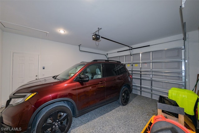 garage featuring a garage door opener