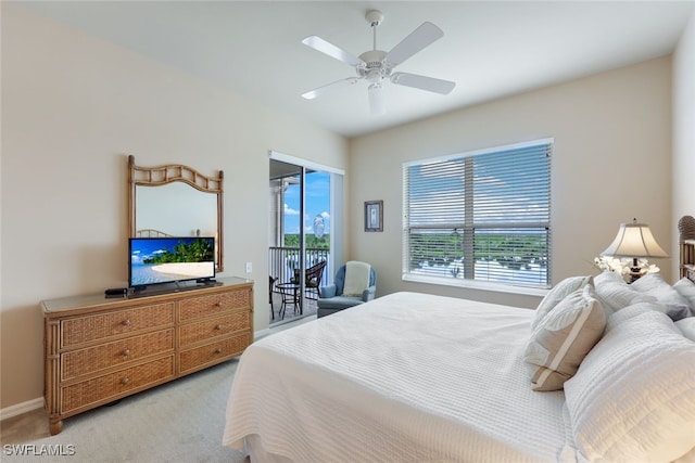 bedroom featuring ceiling fan and light colored carpet