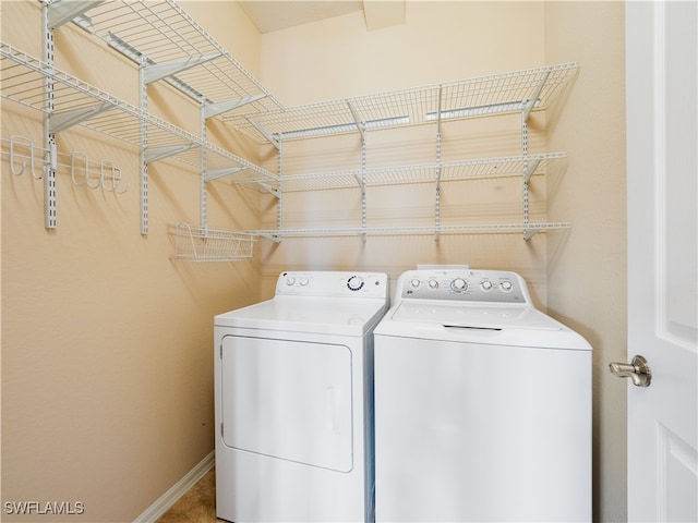 washroom with separate washer and dryer