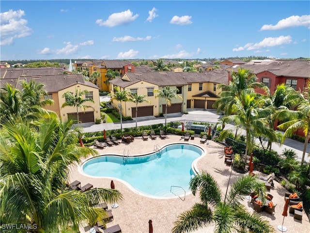 view of swimming pool with a patio area