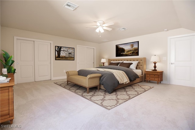 bedroom with carpet floors, vaulted ceiling, and ceiling fan