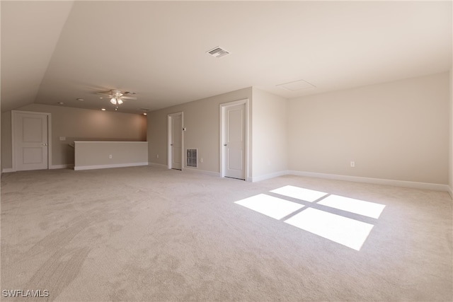 interior space with vaulted ceiling and ceiling fan