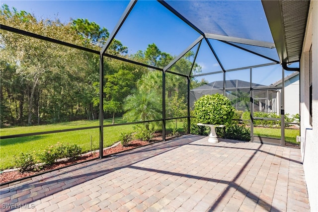 view of patio / terrace with a lanai