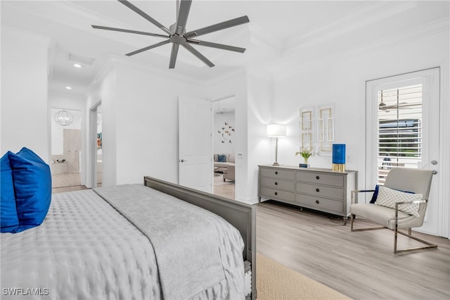 bedroom featuring connected bathroom, ceiling fan, crown molding, and light wood-type flooring