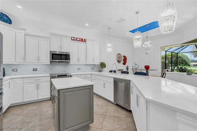 kitchen with white cabinetry, sink, and appliances with stainless steel finishes