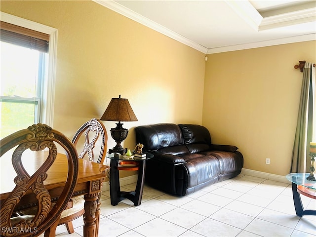 sitting room with light tile patterned floors and crown molding