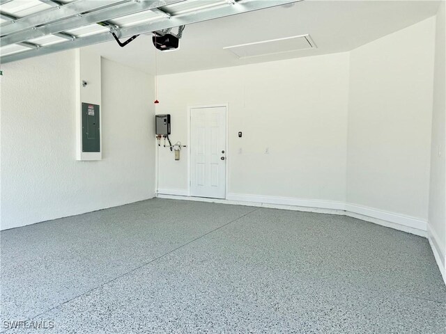 2001 Jeronimo Rd, Labelle, FL 33935 - garage featuring electric panel and a garage door opener