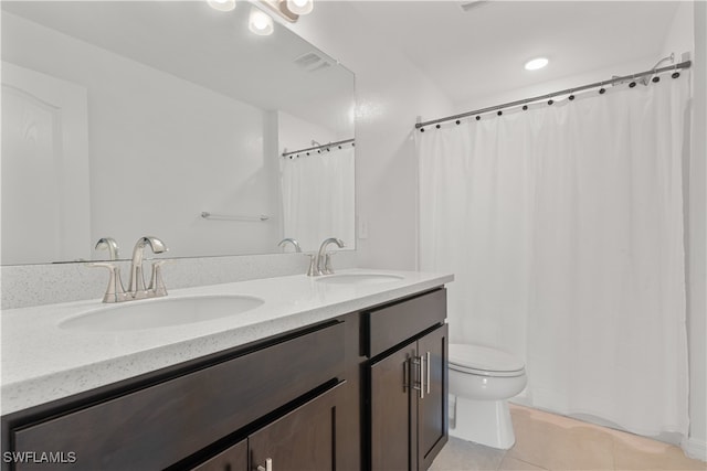 bathroom featuring vanity, tile patterned flooring, toilet, and a shower with shower curtain