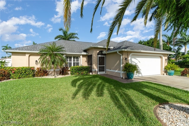 single story home with a garage and a front lawn