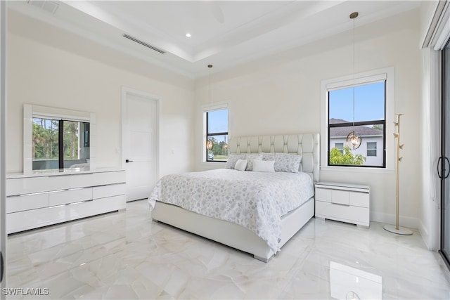 bedroom with ceiling fan and multiple windows