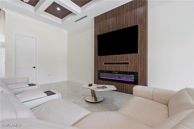 living room with beam ceiling, a fireplace, and coffered ceiling