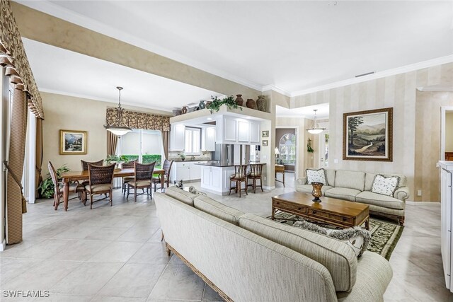 tiled living room with ornamental molding