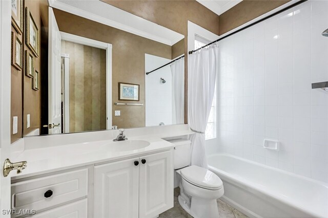 full bathroom featuring vanity, shower / bath combo, and toilet