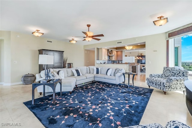 living room with ceiling fan