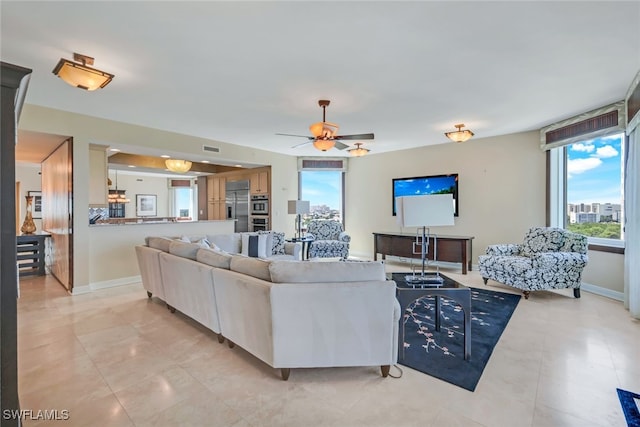 living room featuring ceiling fan