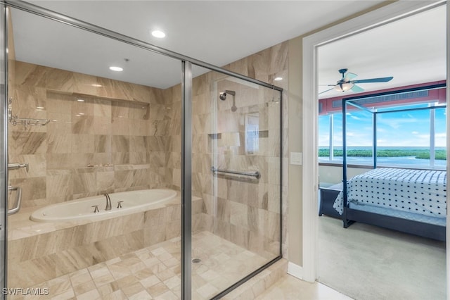 bathroom featuring ceiling fan and shower with separate bathtub