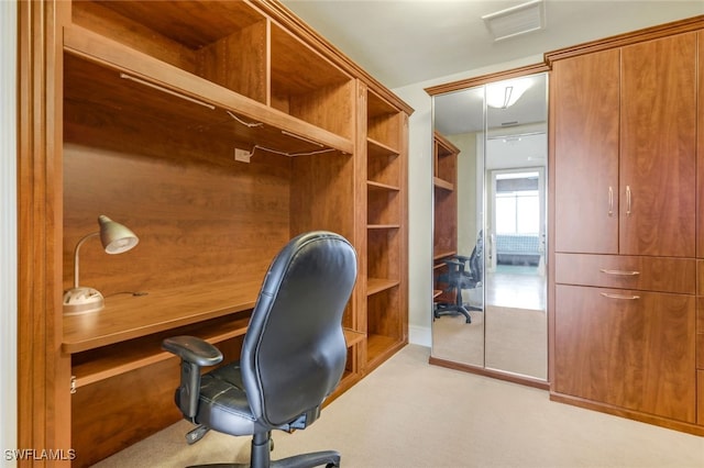 office area featuring light colored carpet