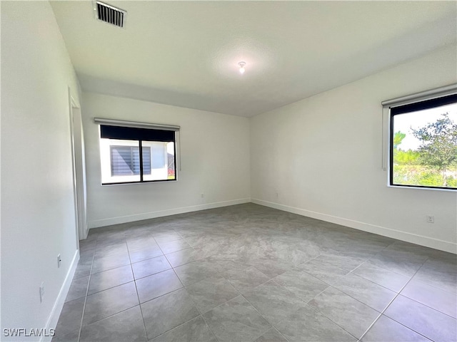 view of tiled spare room