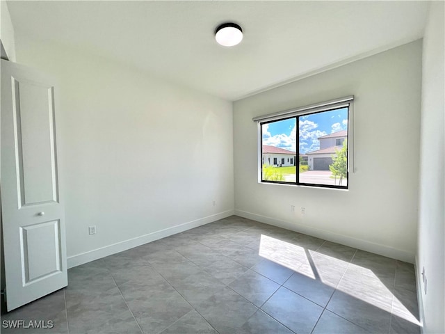 view of tiled empty room