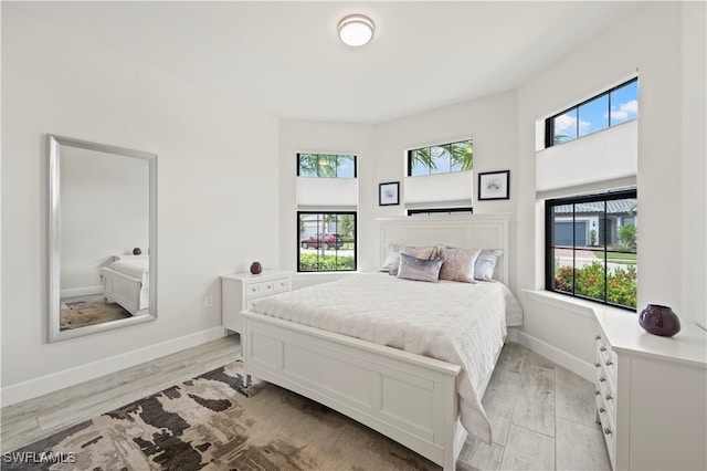 bedroom featuring light hardwood / wood-style flooring