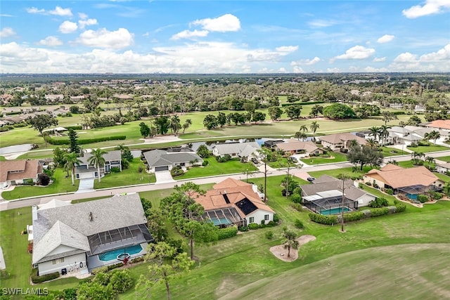 bird's eye view featuring view of golf course and a residential view