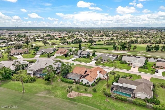 aerial view with view of golf course and a residential view