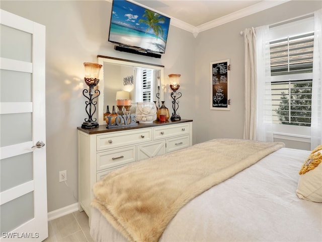 bedroom with crown molding