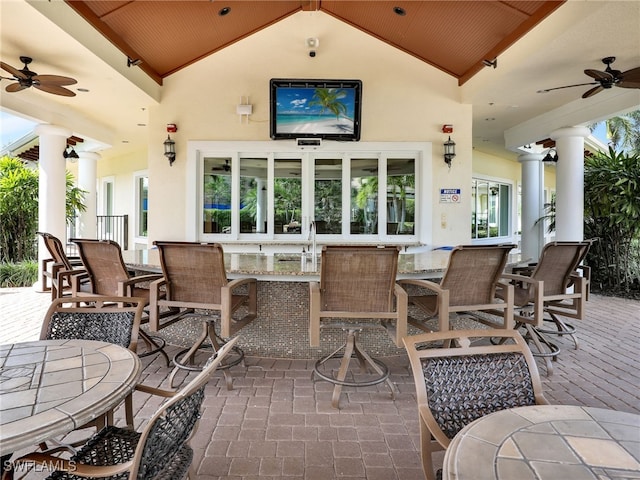 view of patio / terrace featuring ceiling fan