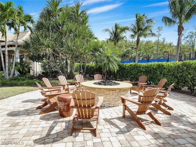 view of patio / terrace featuring a fire pit