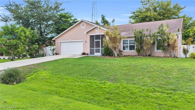 single story home with a garage and a front lawn